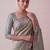 Sea green woven design zari silk blend banarasi saree