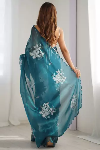 Teal floral beads and stones organza saree