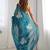 Teal floral beads and stones organza saree