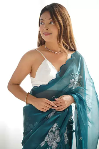 Teal floral beads and stones organza saree