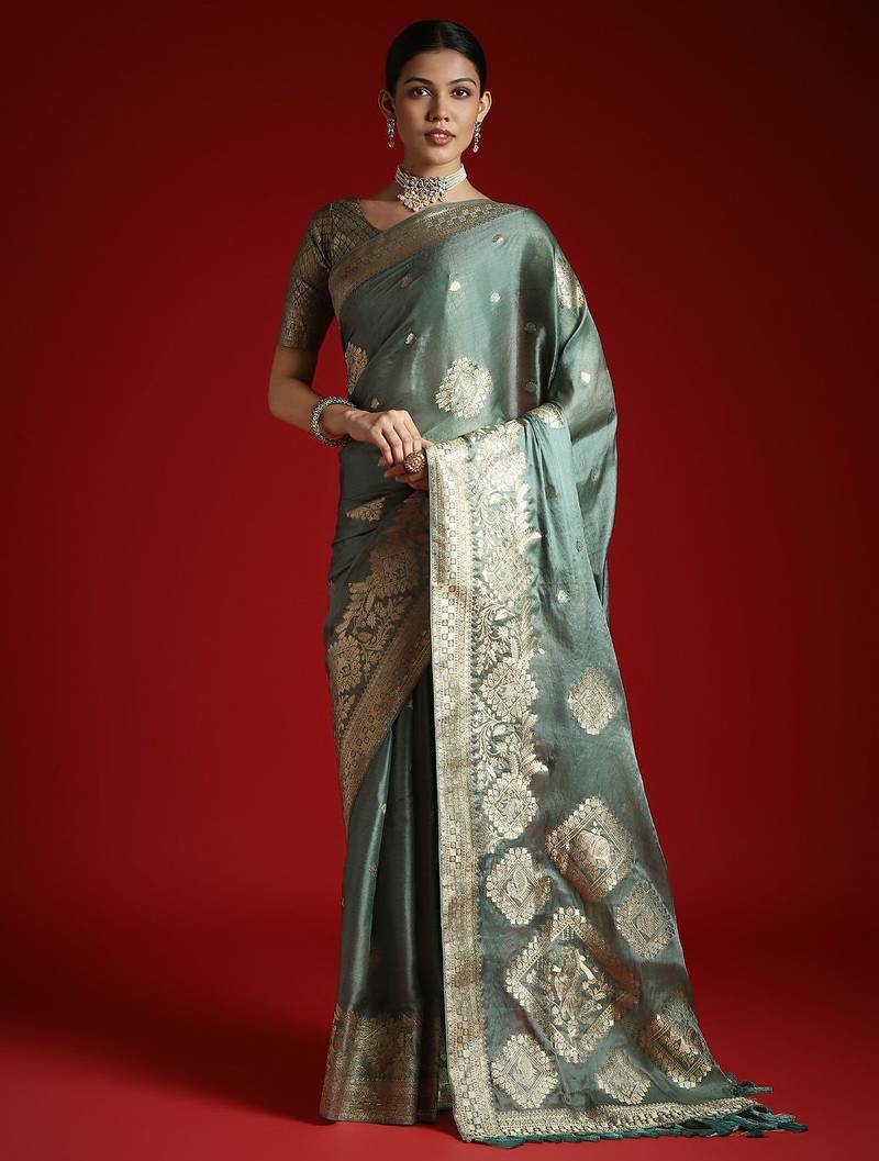 Green ethnic motifs woven design satin banarasi saree