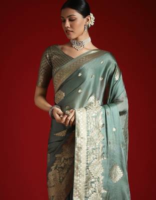 Green ethnic motifs woven design satin banarasi saree 4