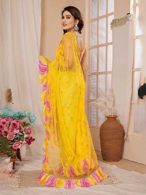 Yellow embellished ruffles border saree 3