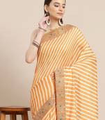Mustard mustard yellow & cream-coloured leheriya saree