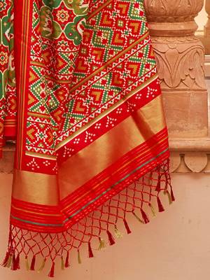 Green ethnic motifs printed zari ikat saree 4
