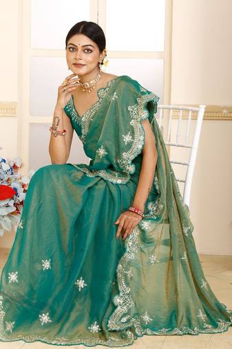 Green women green embroidered tissue saree
