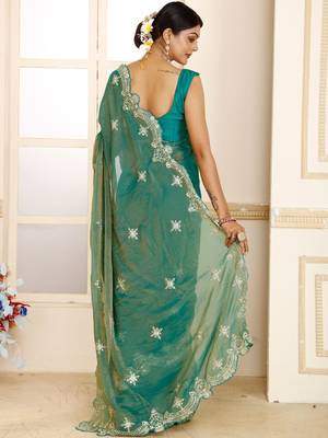 Green women green embroidered tissue saree 3