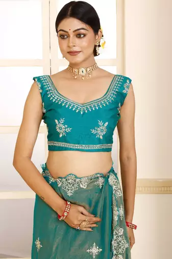 Green women green embroidered tissue saree