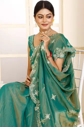 Green women green embroidered tissue saree