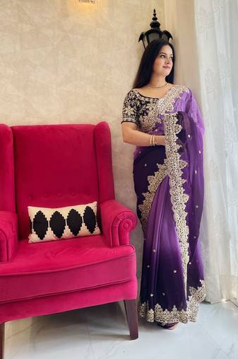 Purple purple & gold-tones floral embroidered saree