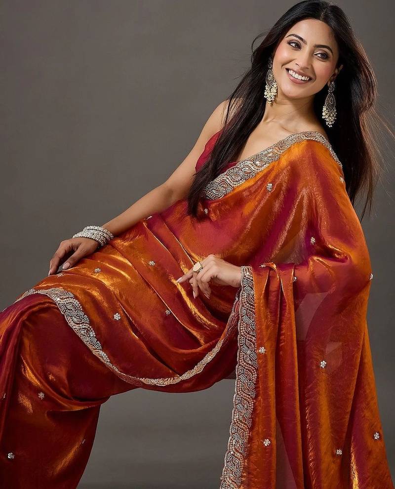 Rust embellished beads and stones satin designer saree
