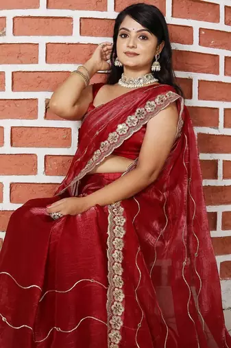 Maroon women red solid striped mirror work tissue saree