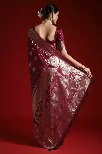 Purple ethnic woven design zari satin saree with matching blouse
