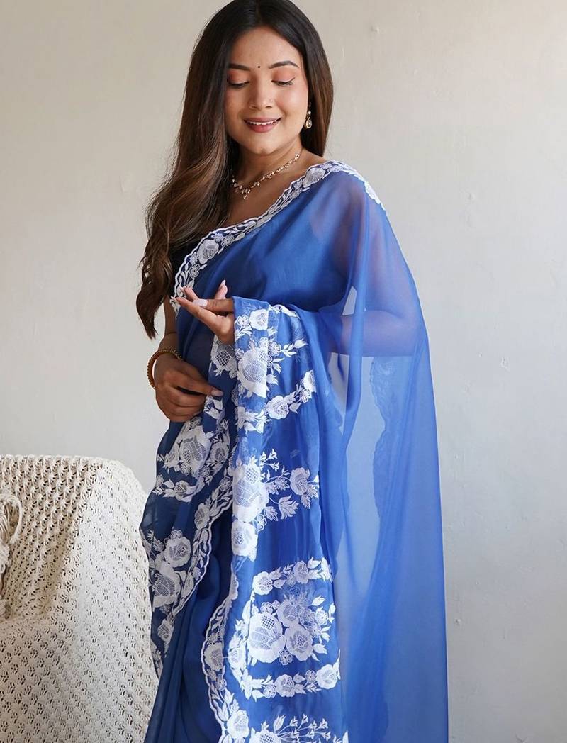Blue embroidered organza saree