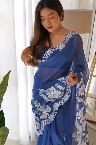 Blue embroidered organza saree