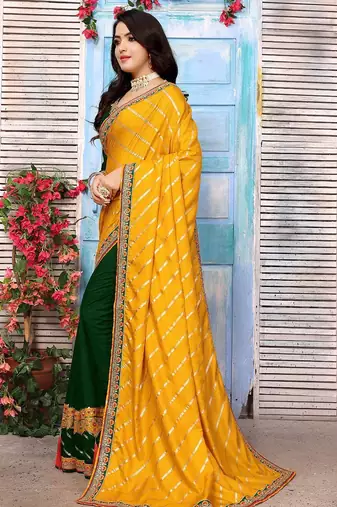 Yellow striped sequinned half and half saree