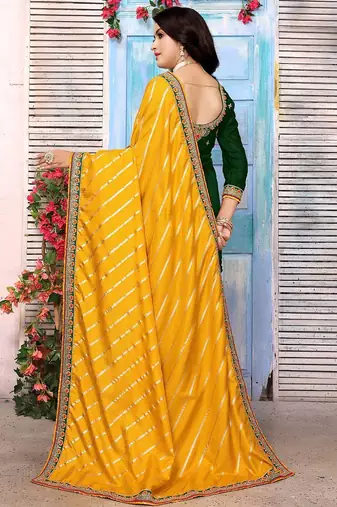 Yellow striped sequinned half and half saree