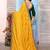 Yellow striped sequinned half and half saree