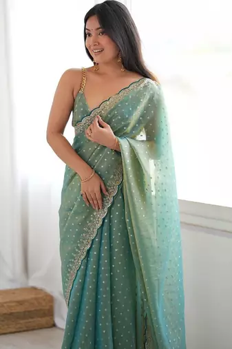Sea green embellished embroidered silk blend designer saree