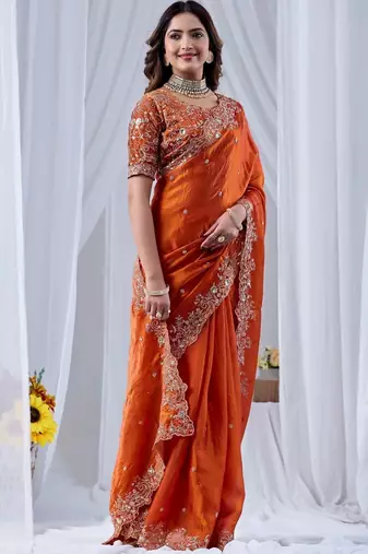 Orange ethnic motifs embroidered silk blend designer saree