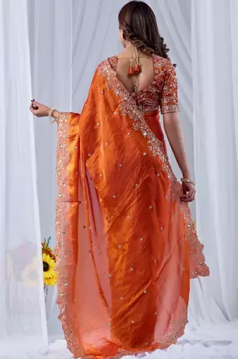 Orange ethnic motifs embroidered silk blend designer saree