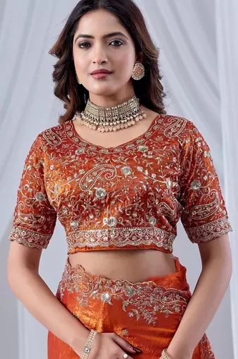 Orange ethnic motifs embroidered silk blend designer saree