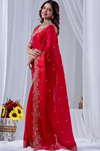 Red ethnic motifs embroidered silk blend designer saree