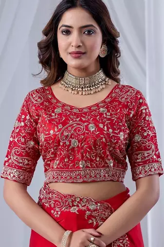 Red ethnic motifs embroidered silk blend designer saree