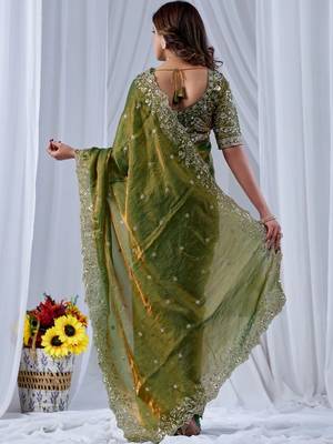Green ethnic motifs embroidered silk blend designer saree 4