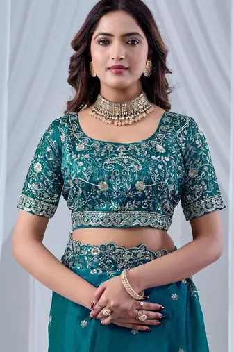 Teal ethnic motifs embroidered silk blend designer saree