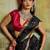 Black women black ethnic motifs zari woven silk blend banarasi saree with blouse piece