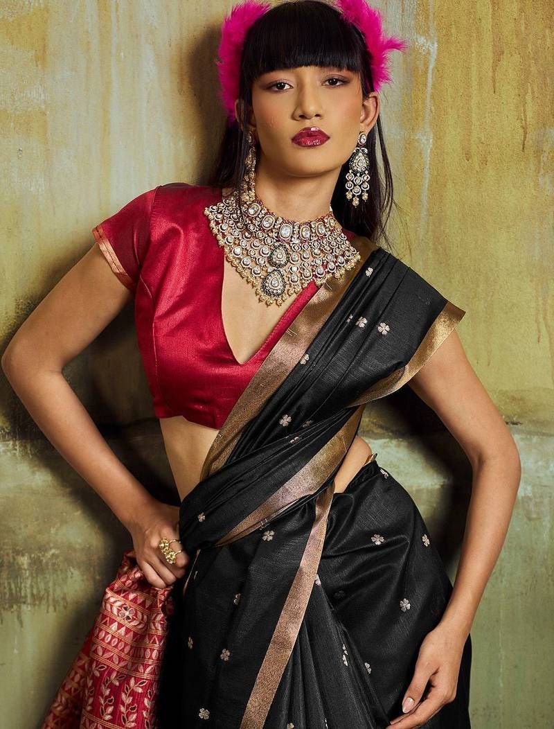 Black women black ethnic motifs zari woven silk blend banarasi saree with blouse piece