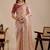 Peach floral sequinned silk blend designer saree