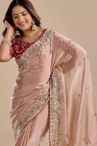 Peach floral sequinned silk blend designer saree