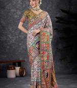 White ethnic motifs banarasi saree with matching blouse