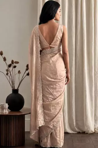 Peach embellished beads and stones tissue designer saree