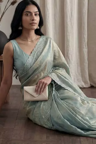 Teal embellished beads and stones tissue designer saree