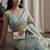 Teal embellished beads and stones tissue designer saree