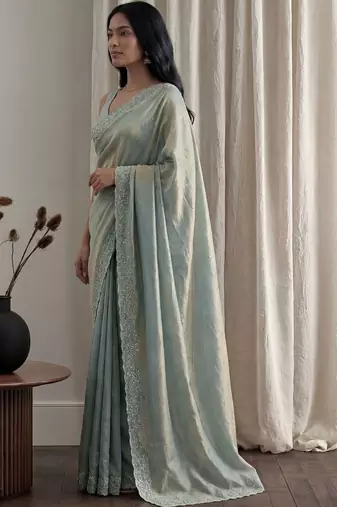 Teal embellished beads and stones tissue designer saree