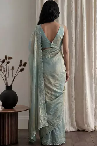 Teal embellished beads and stones tissue designer saree
