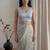 Teal embellished beads and stones tissue designer saree