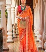 Orange orange & red bandhani beads and stones  georgette saree