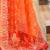 Orange orange & red bandhani beads and stones  georgette saree