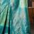 Blue blue & gold-toned ethnic motifs woven design zari kanjeevaram saree