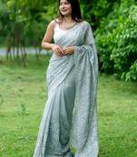 Teal teal embellished sequinned  georgette saree