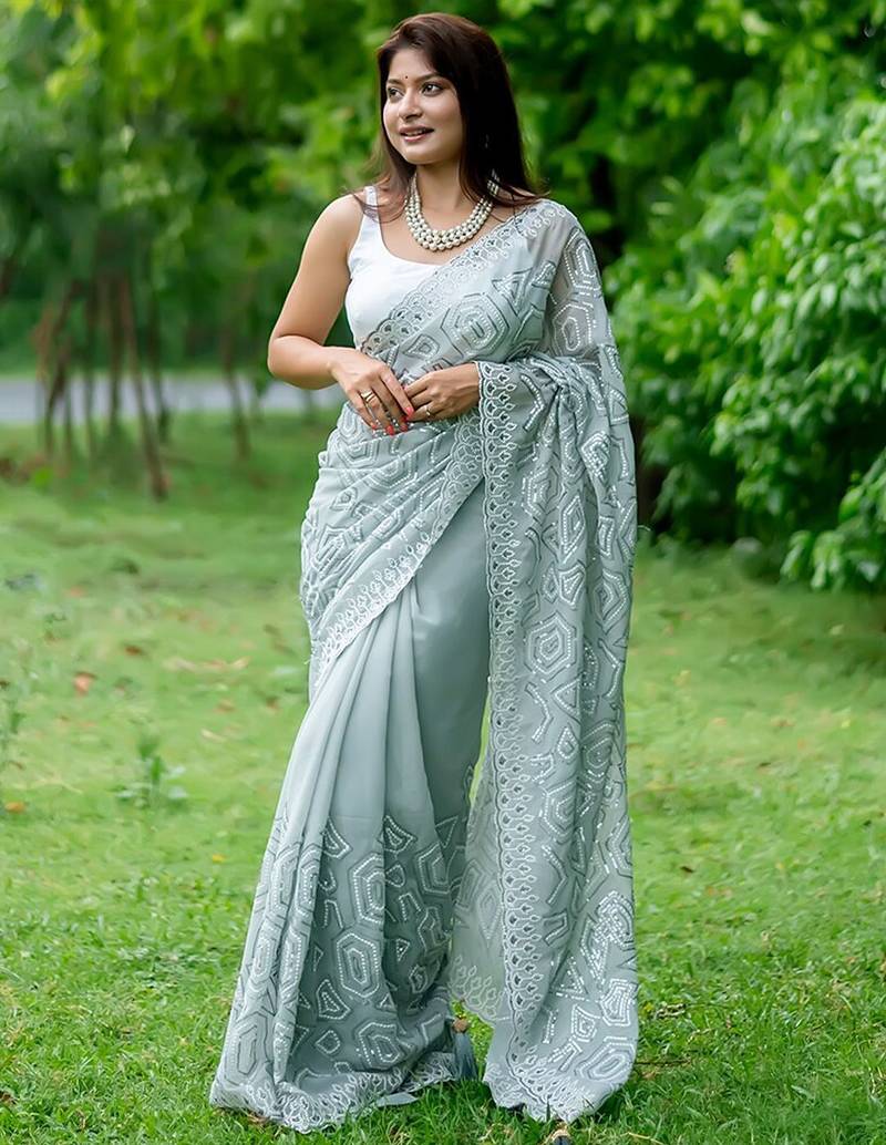 Teal teal embellished sequinned  georgette saree