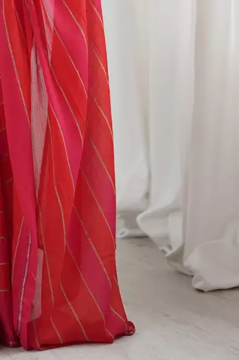 Red striped  georgette zari saree with blouse piece