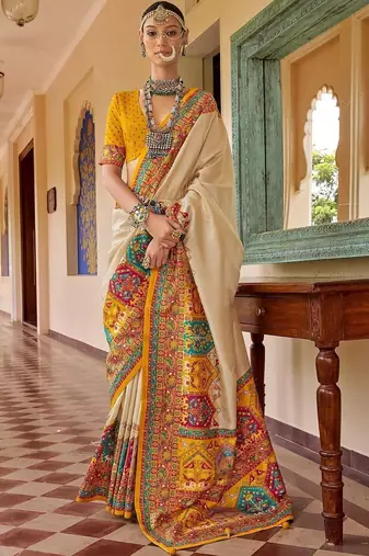 Cream bandhani embroidered silk blend designer saree