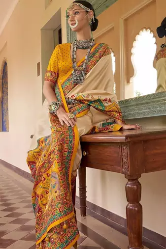 Cream bandhani embroidered silk blend designer saree