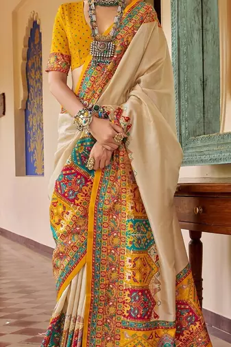 Cream bandhani embroidered silk blend designer saree